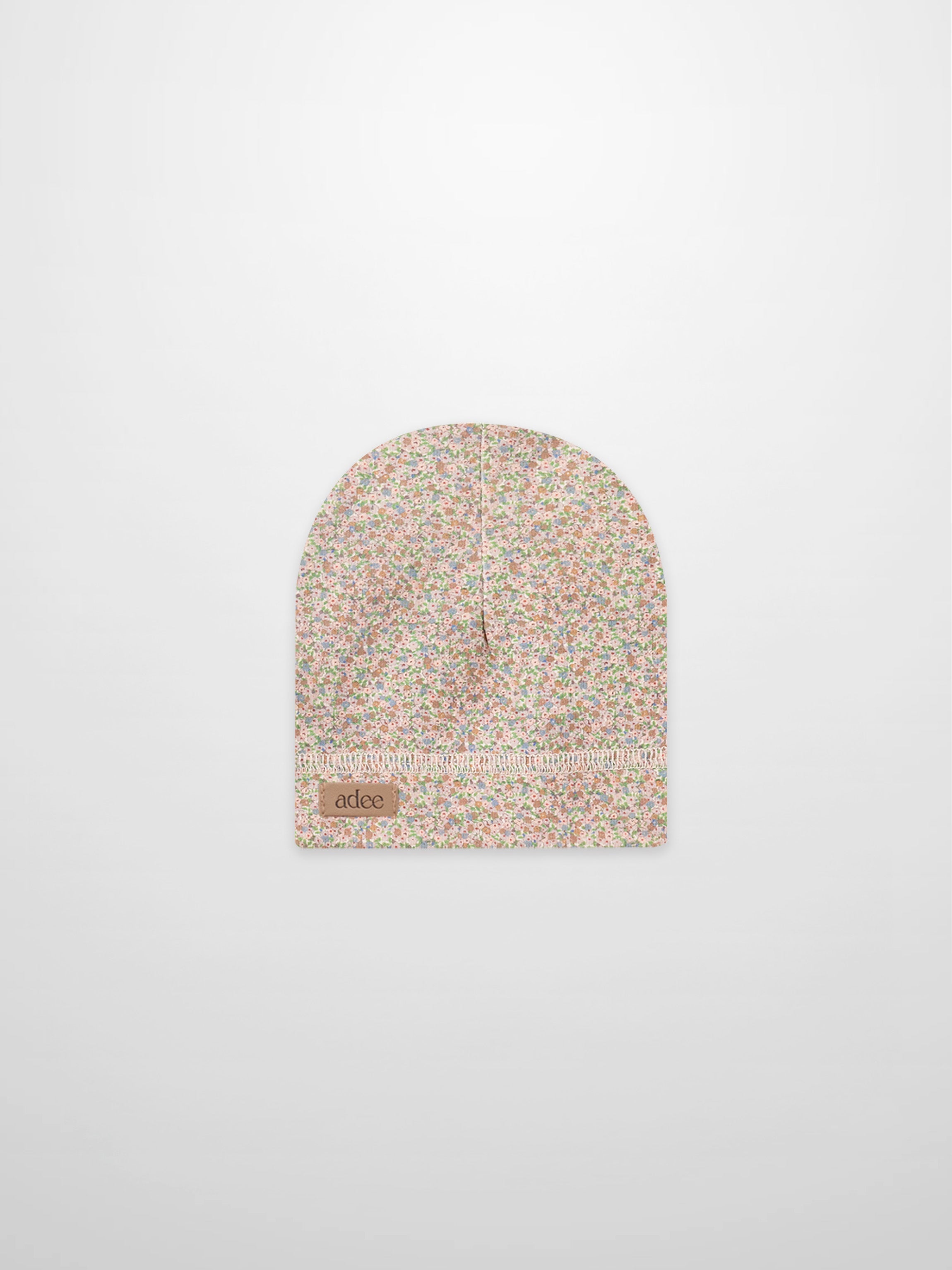 Pastel Petal Hat, floral-patterned girls hat by Adee featuring a visible brand patch