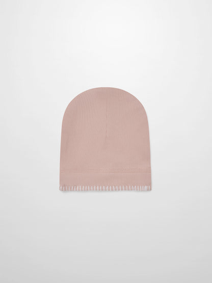 Legacy Stitch Hat by Adee, light pink ribbed knit girls beanie with fringed hem