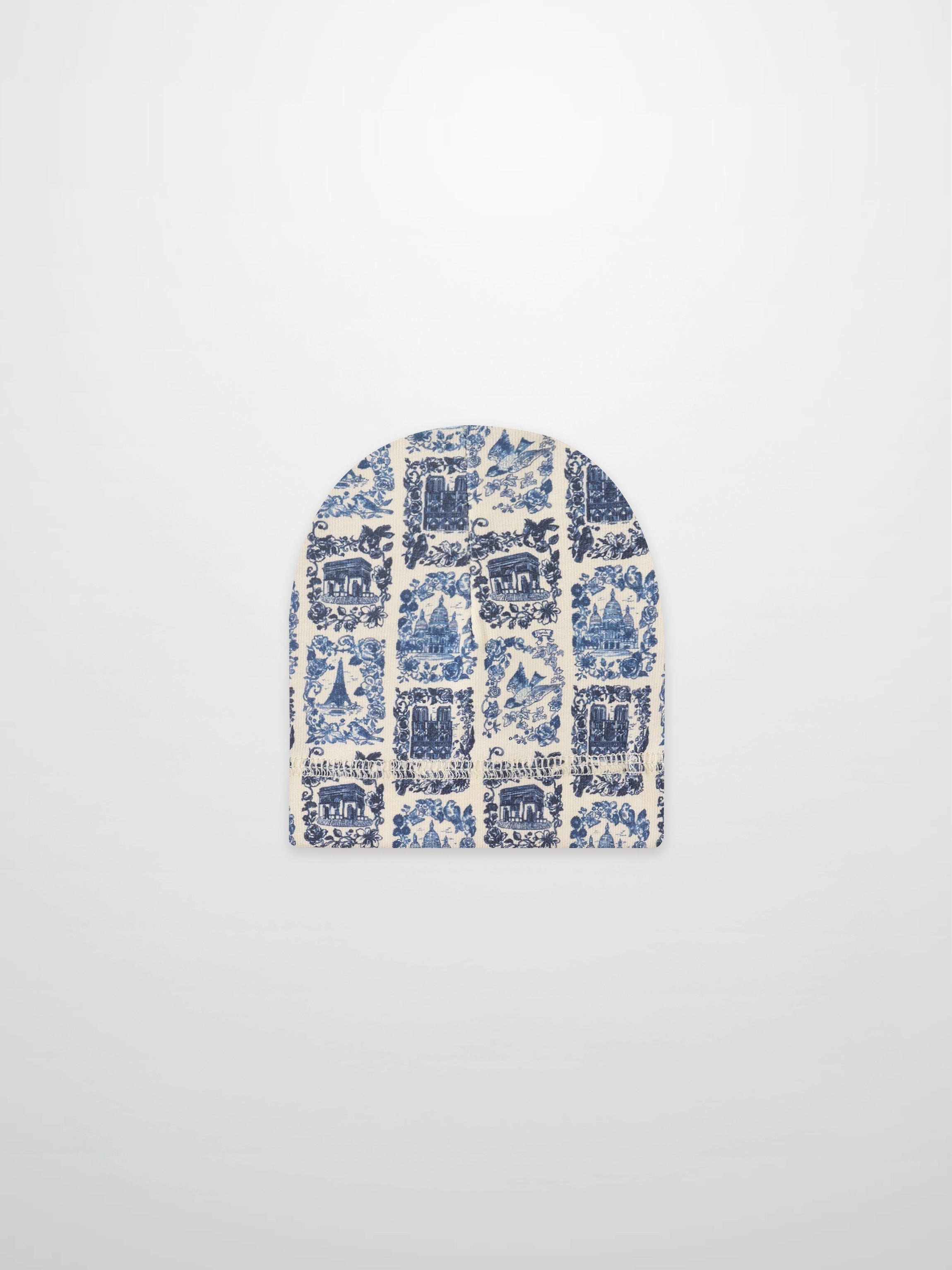 Blue landmark hat for boys; cream fabric with blue architectural print