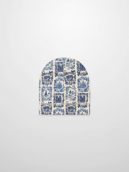 Blue landmark hat for boys; cream fabric with blue architectural print
