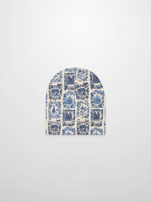 Blue landmark hat for boys; cream fabric with blue architectural print