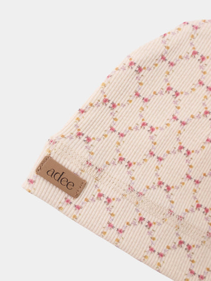 Floral Garland Hat for girls by Adee in beige ribbed fabric with tiny pink and yellow flowers.