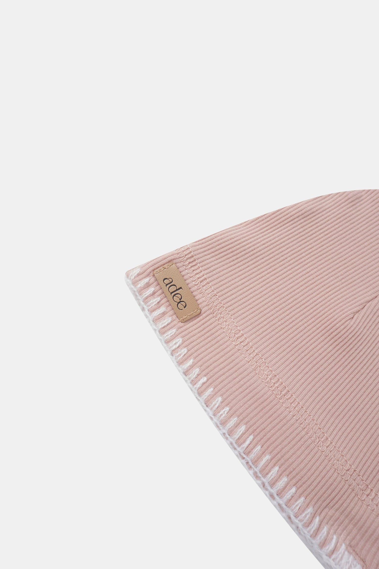 Legacy Stitch Hat – Light Pink girls beanie by Adee; ribbed knit with white edge trim
