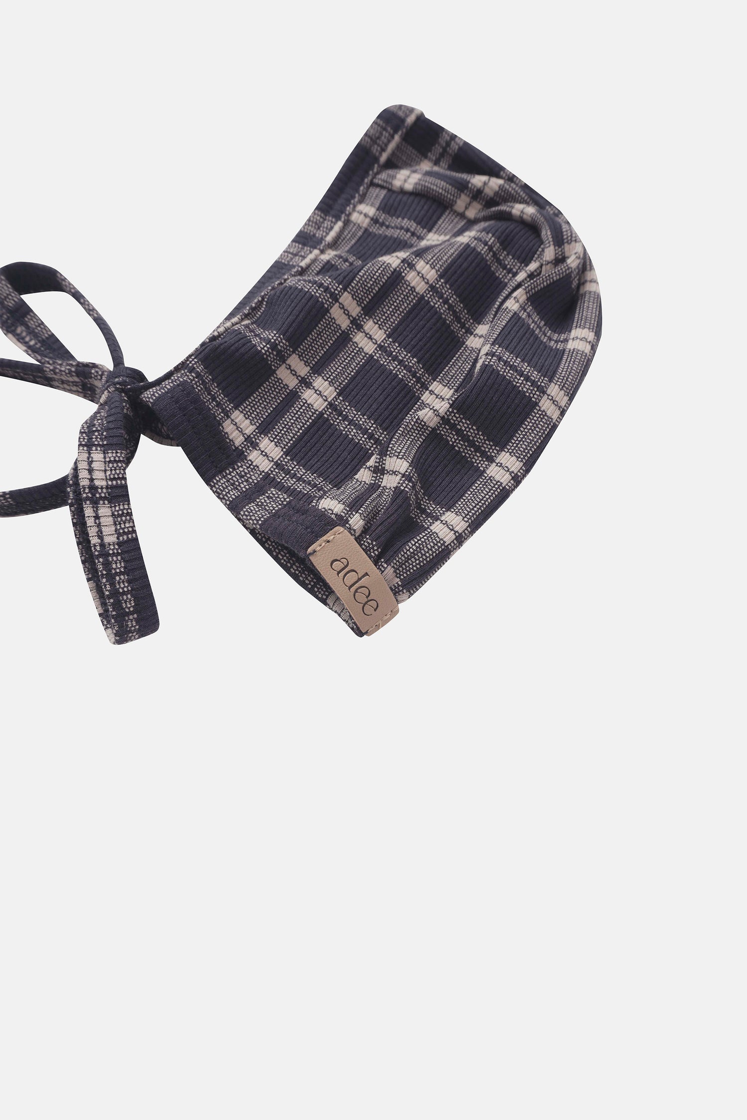 Boys layette set in navy plaid with tied headband and Adee brand tag