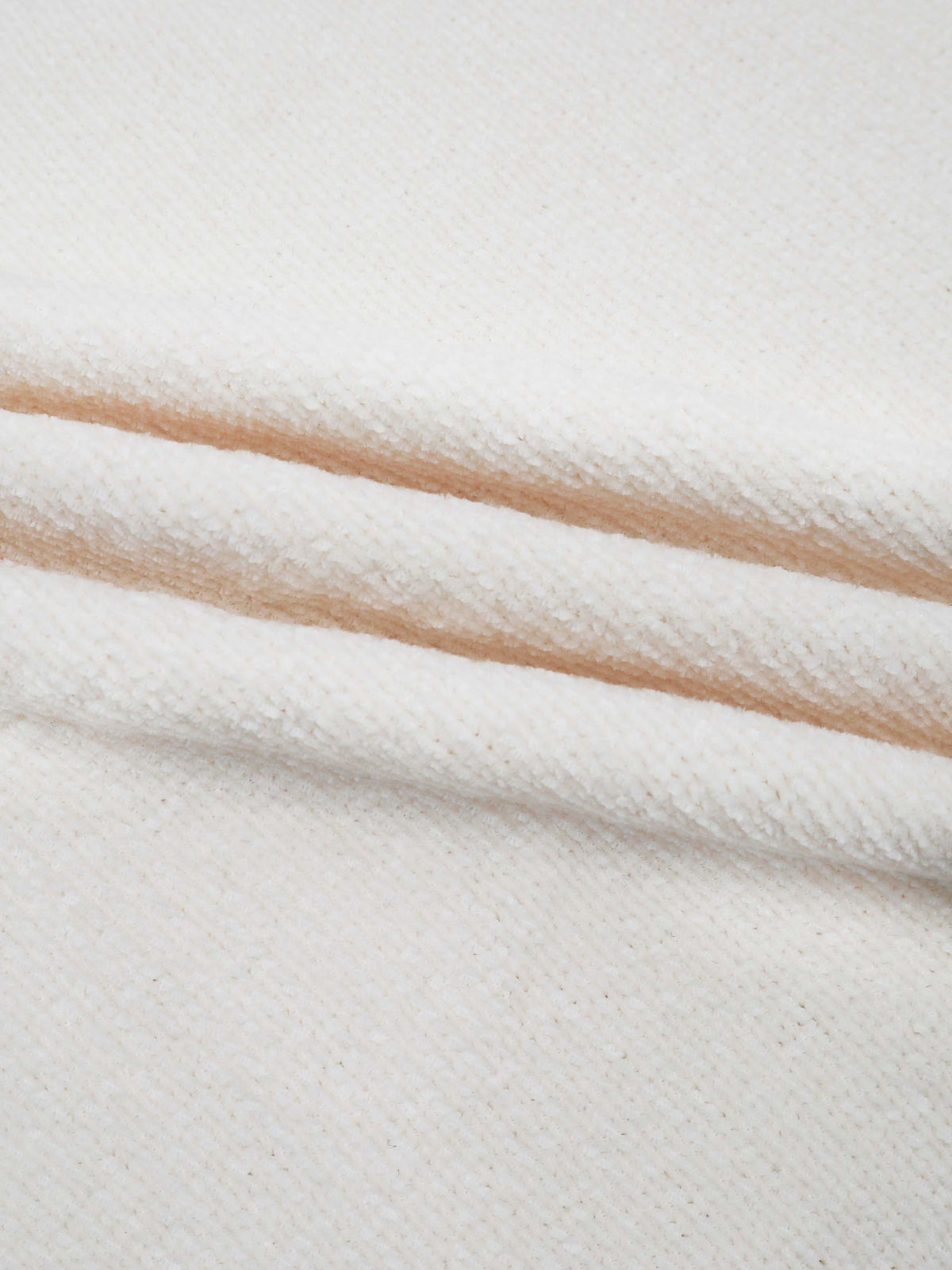 soft off-white blanket fabric perfect for cozy comfort.