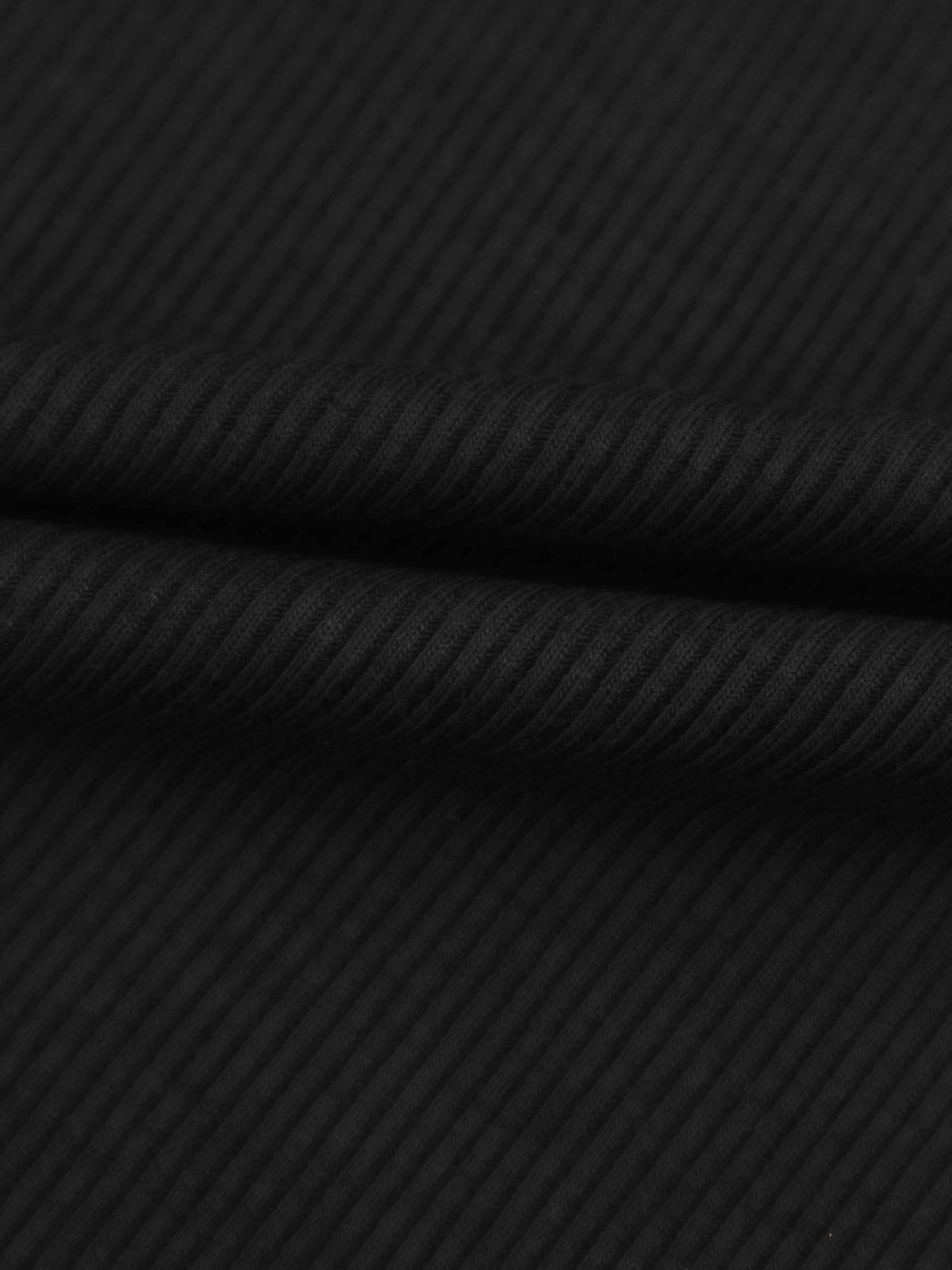 Soft ribbed black fabric close-up
