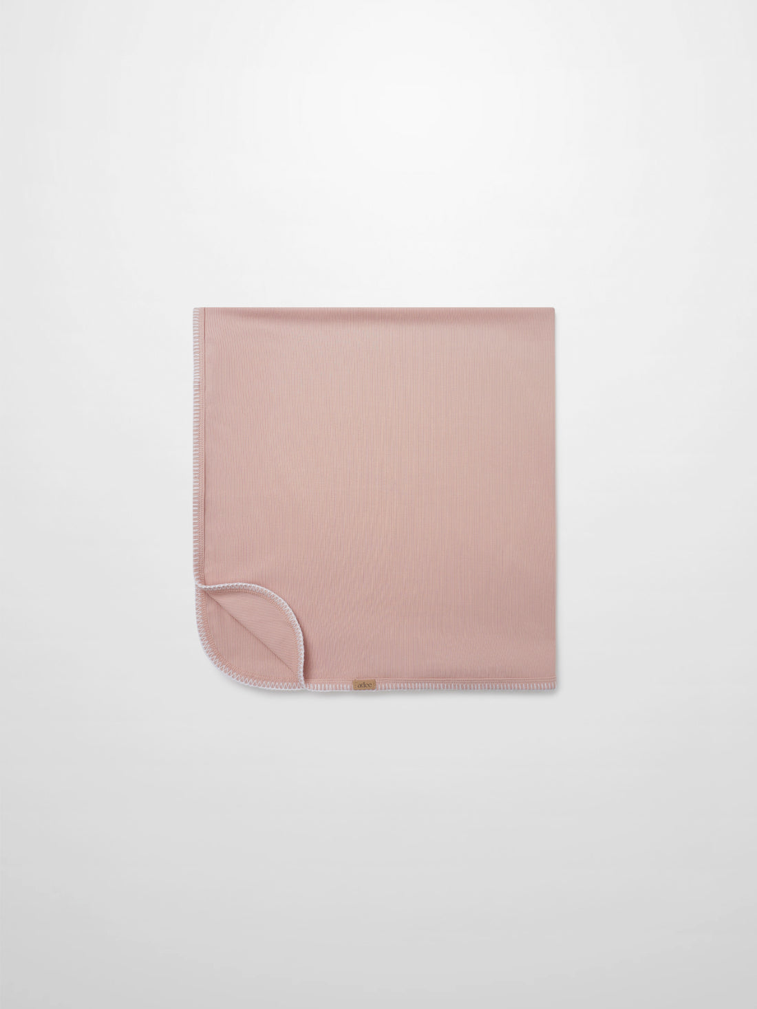 Legacy Stitch Blanket by Adee, light pink girls receiving swaddle blanket with white stitched edge.