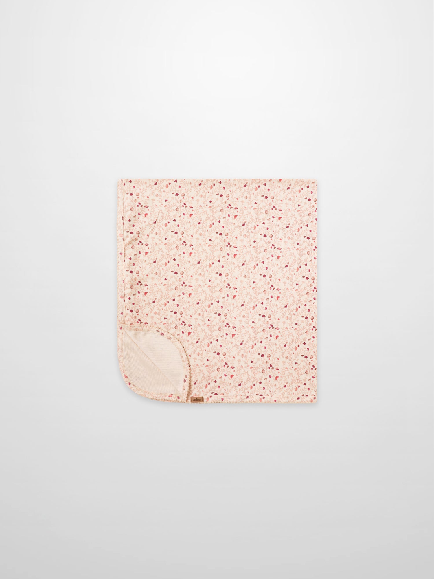 Garden Sprinkles Blanket by Adee; pink floral girls swaddle blanket with beige underside.