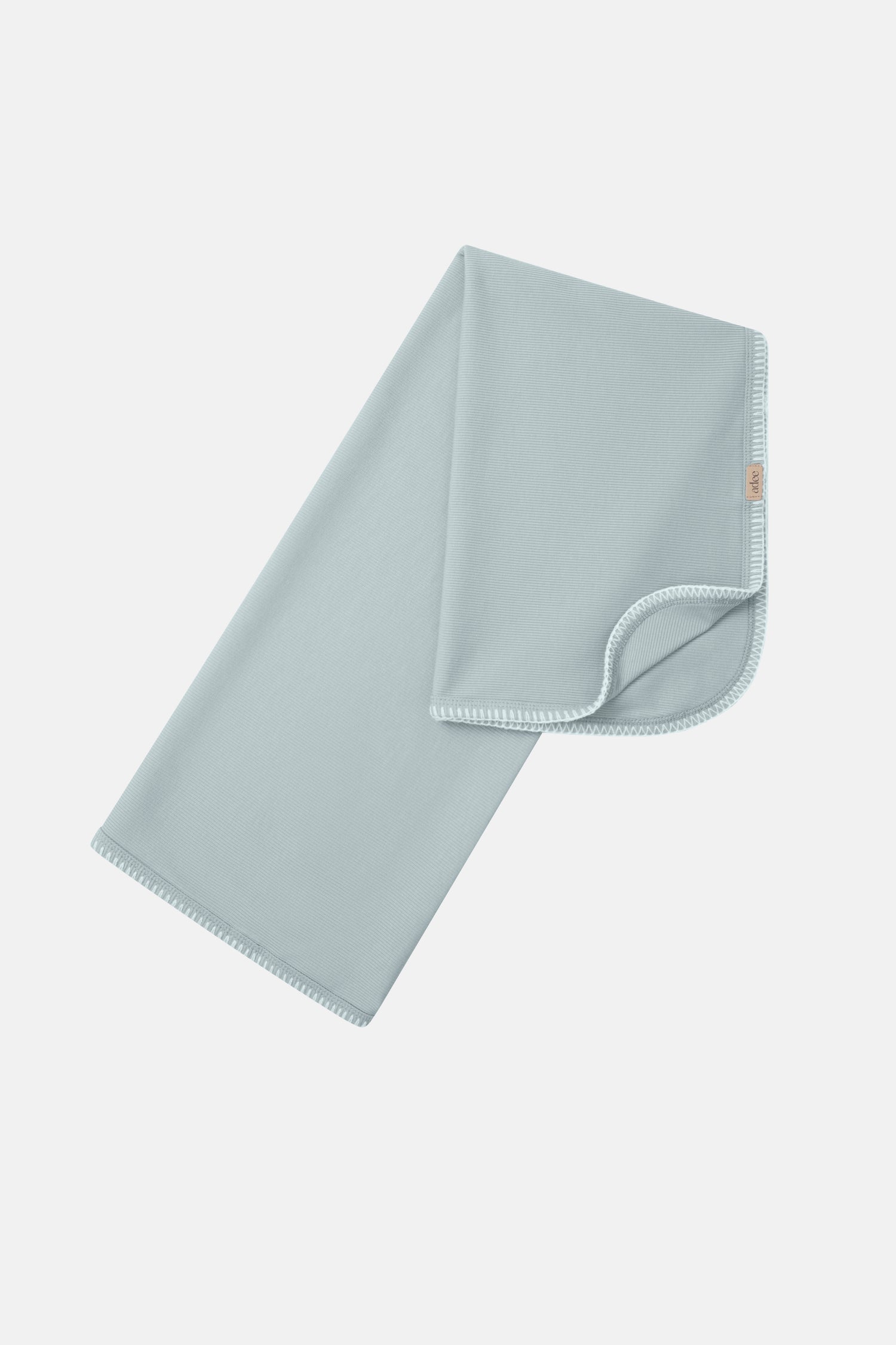 Legacy Stitch Blanket by Adee, light blue boys swaddle blanket with white stitched edge.