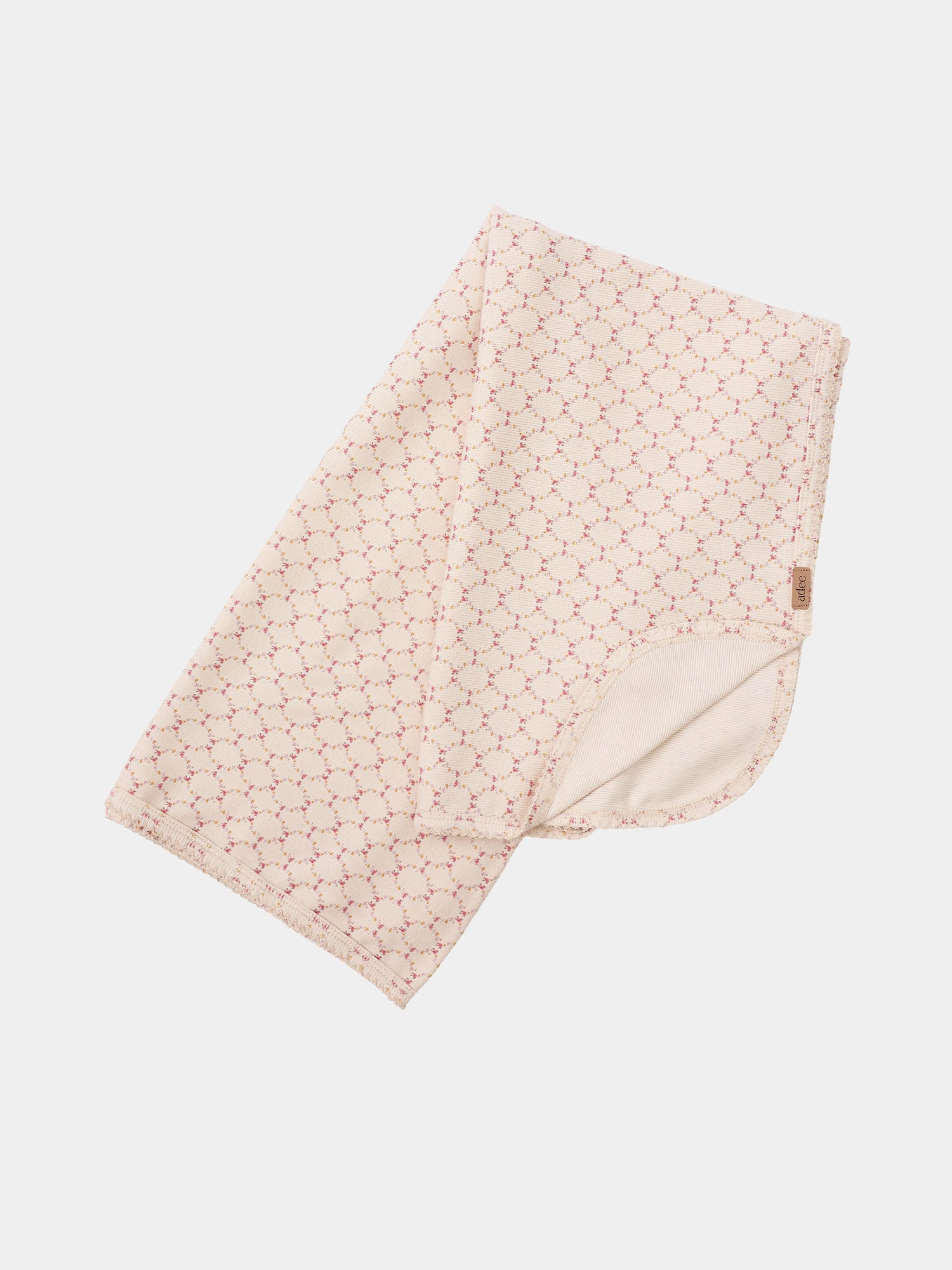 Floral Garland Layette Set blanket by Adee in pale pink with a small floral lattice pattern