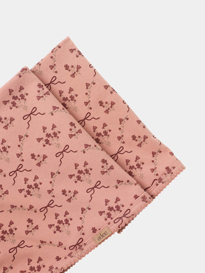 Bow Bouquet Blanket for girls swaddle, pink with burgundy floral clusters and ribbon motifs by Adee