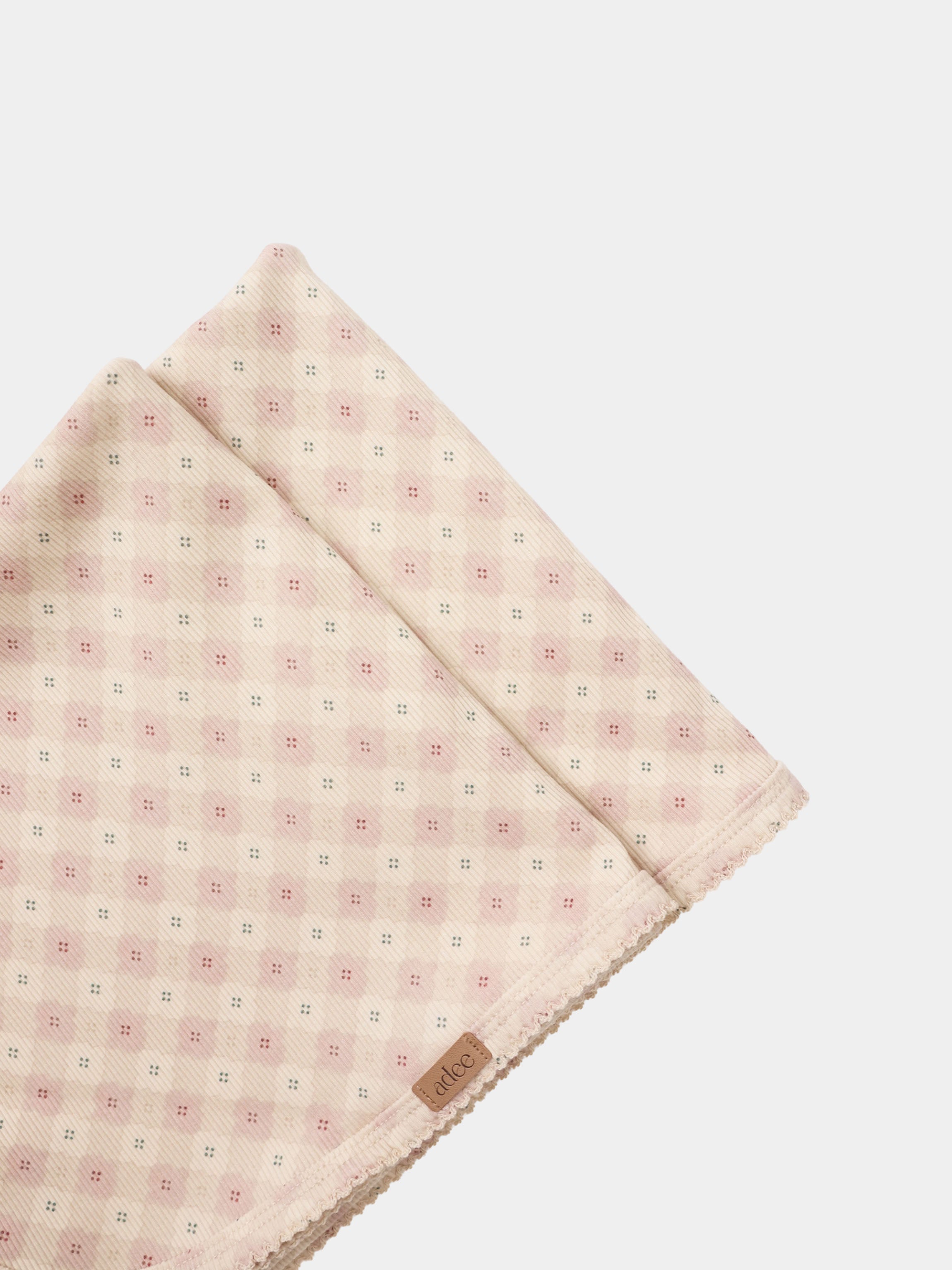 Little Button Pink layette set for girls by Adee, soft pink fabric with tiny dotted pattern