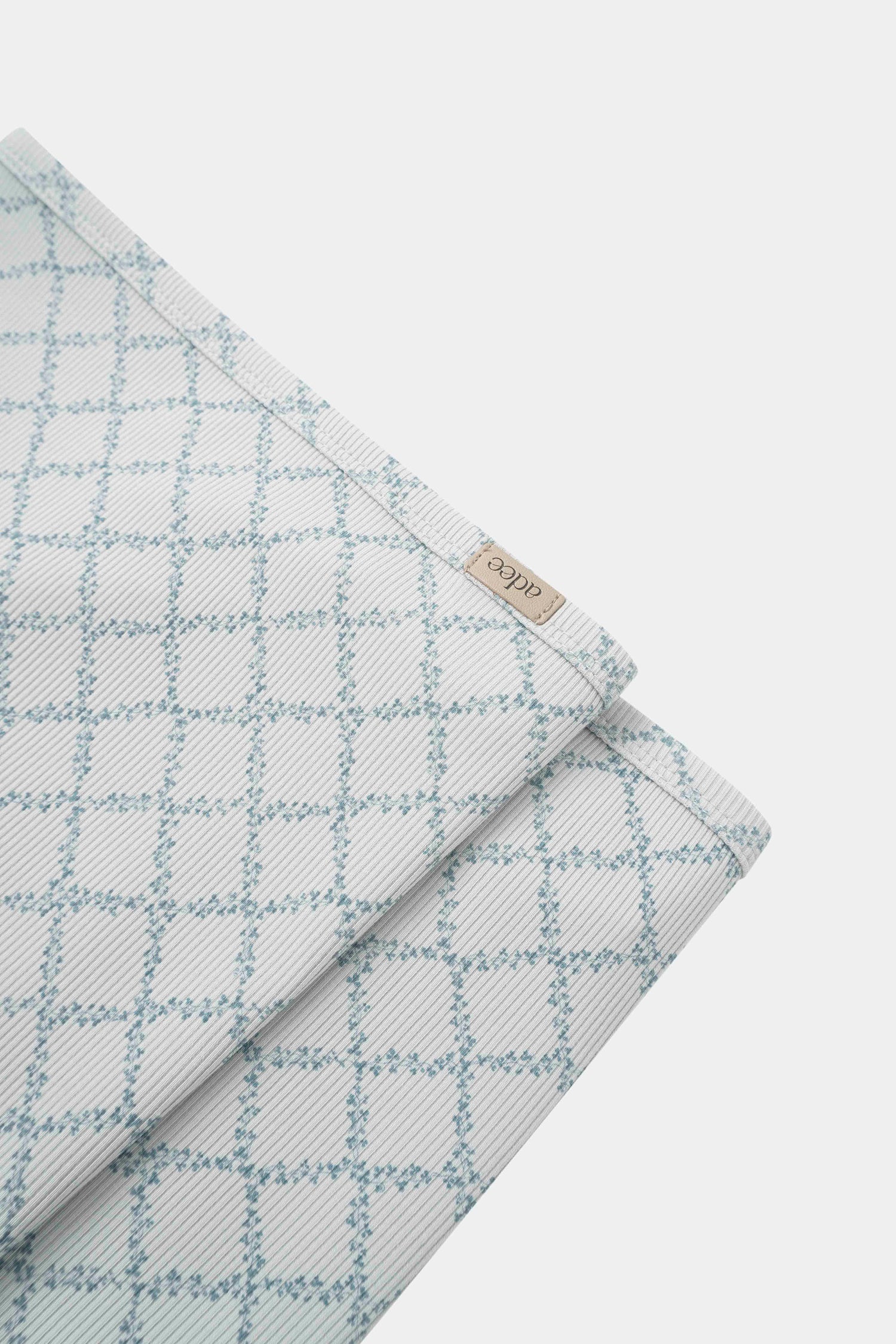 Blue Leaf Blanket swaddle for boys by Adee in light-blue grid pattern