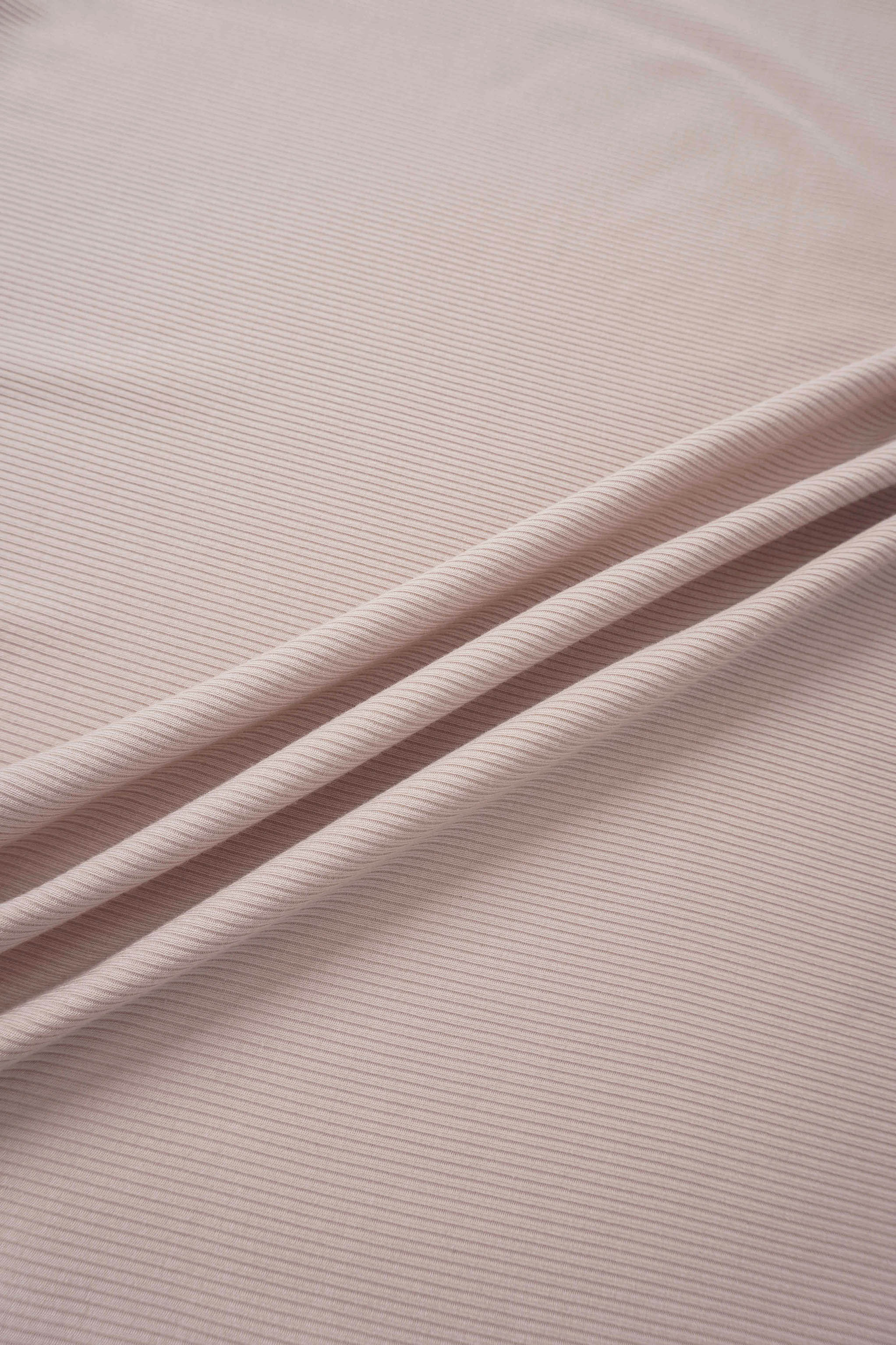 Legacy Stitch Blanket in light pink ribbed fabric; girls swaddle blanket