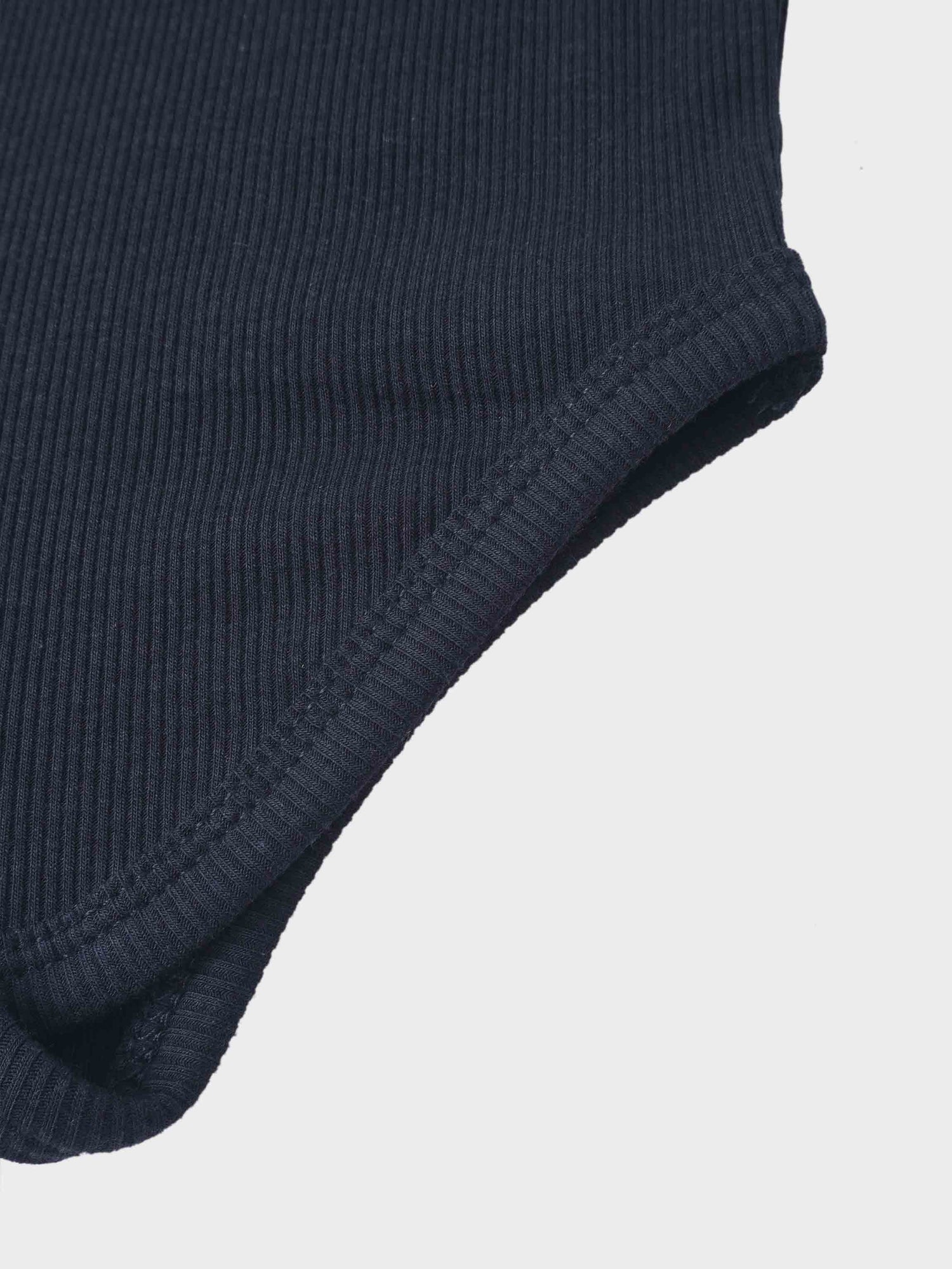 Ribbed Mock Neck Bodysuit in navy by Adee; unisex dressy knit top close-up