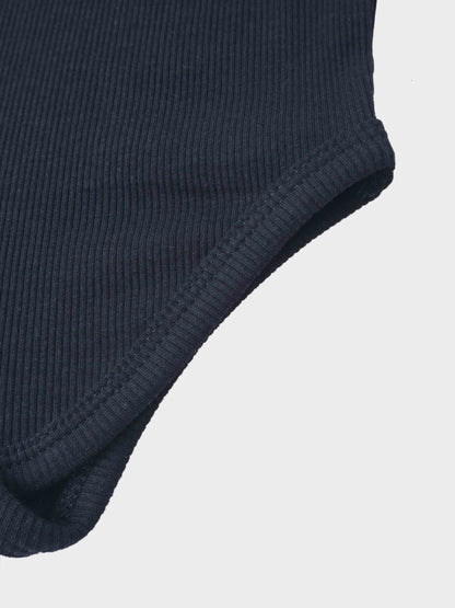Ribbed Mock Neck Bodysuit in navy by Adee; unisex dressy knit top close-up