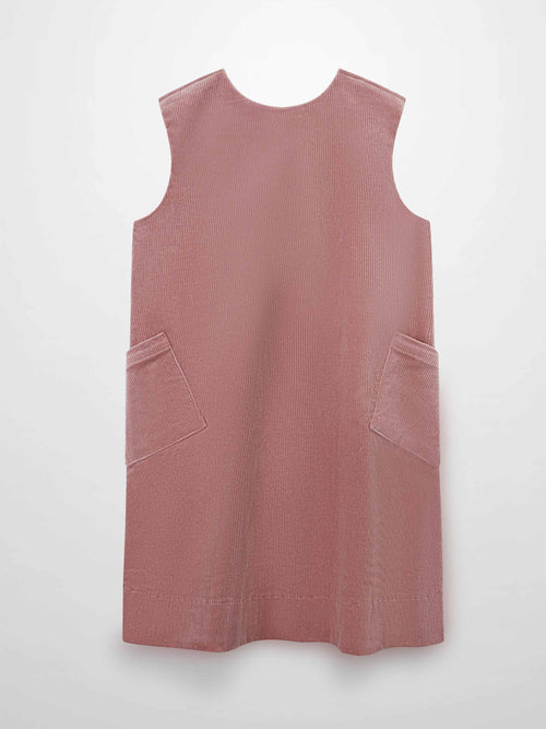 Mauve corduroy jumper dress with front pockets and a slightly flared A-line silhouette.
