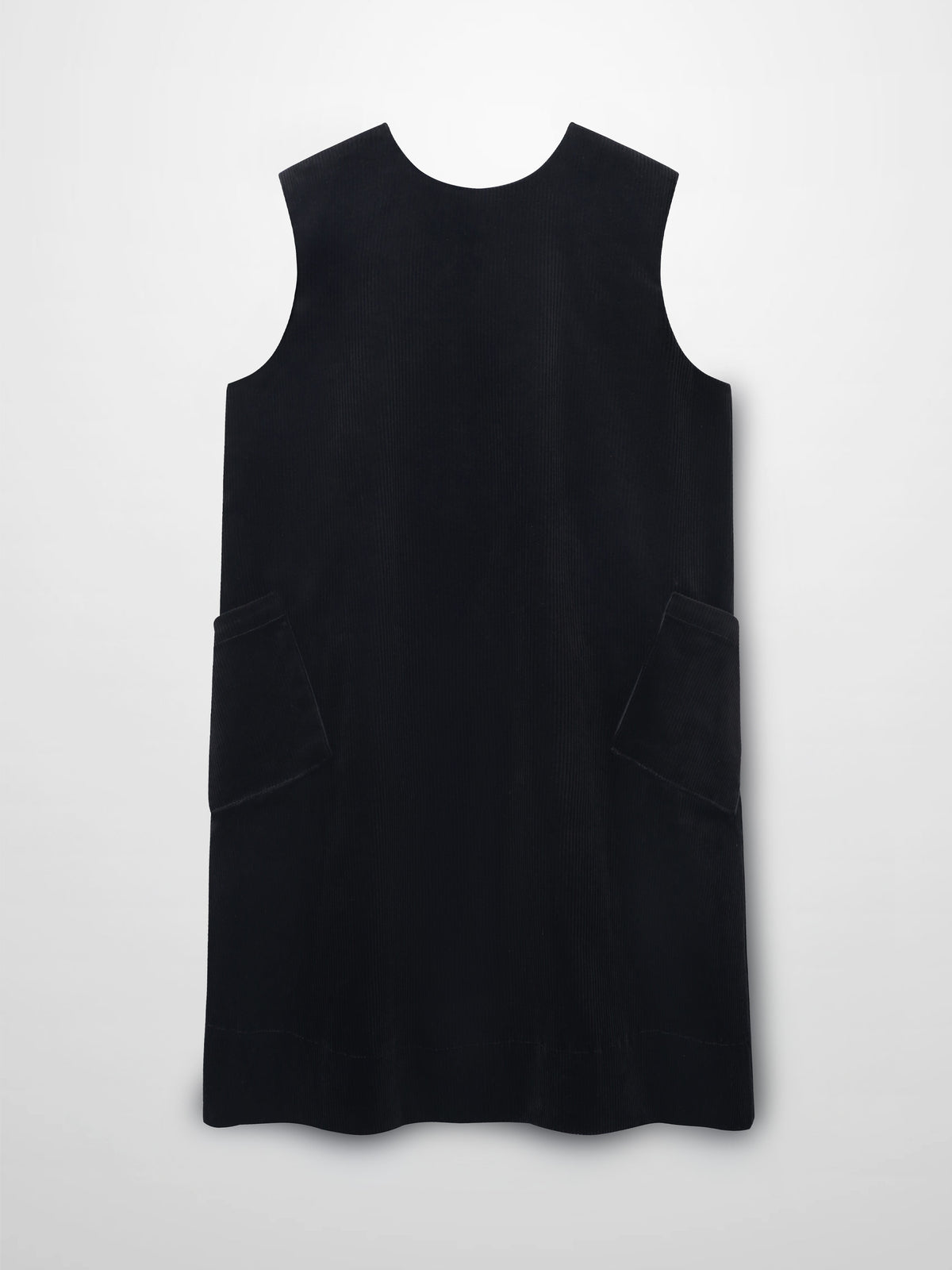Black corduroy jumper with round neckline, A-line silhouette, and front patch pockets.