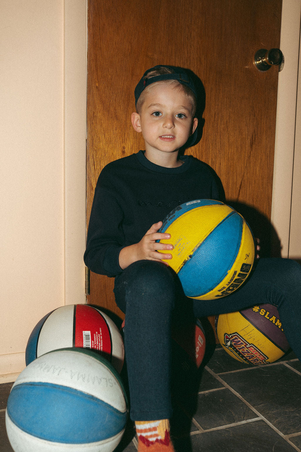 Merci Sweatshirt - Navy for boys by Adee; navy top with several basketballs around a child.