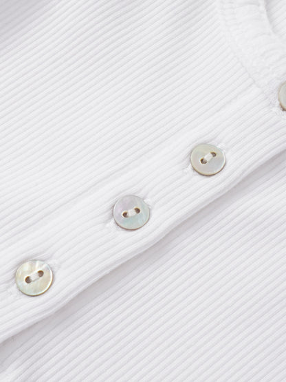 Legacy Stitch Cardigan in white with ribbed knit texture and pearl buttons