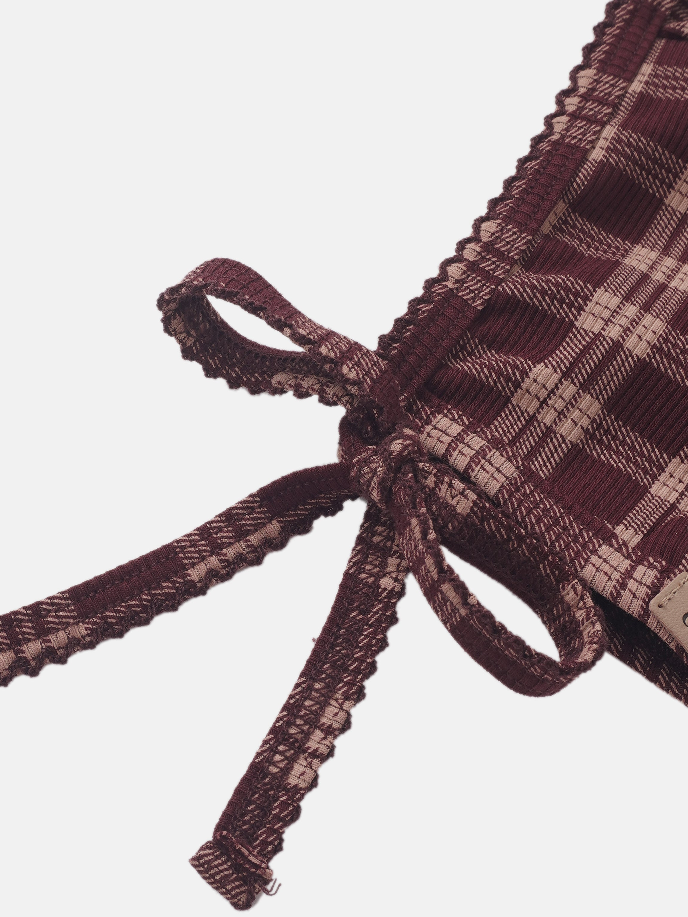 Adee burgundy plaid girls layette set with lace-trimmed ties.