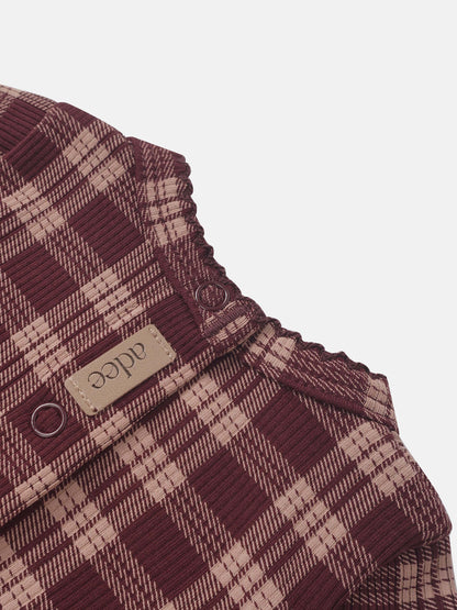 Girls layette set by Adee in burgundy plaid with beige brand tag and elastic trim.