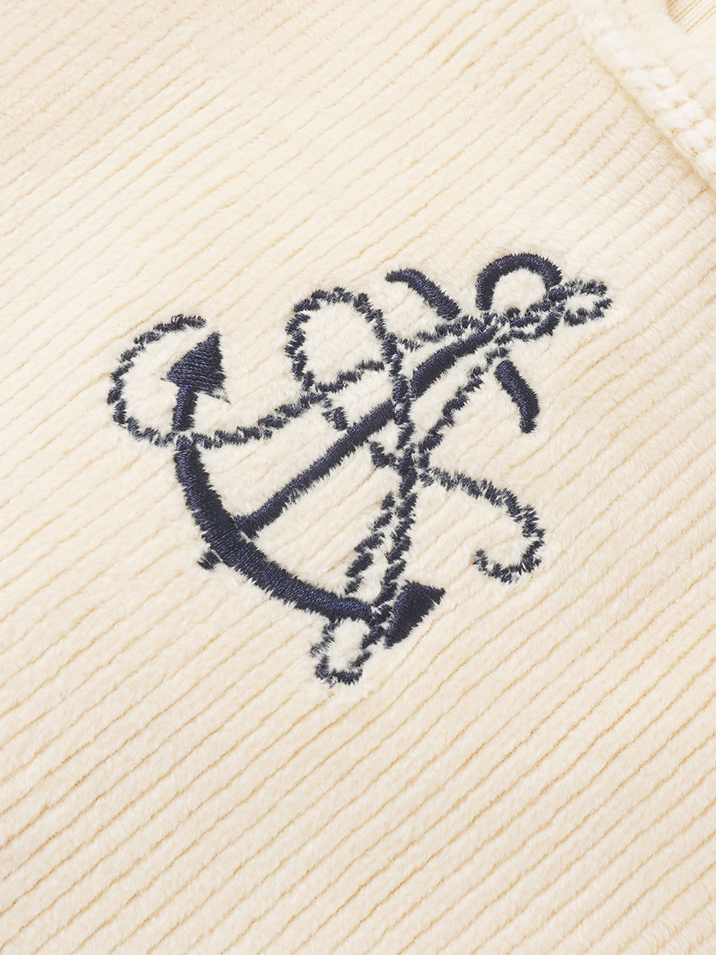 Embroidered Anchor Stretchy by Adee, beige fabric with navy anchor embroidery