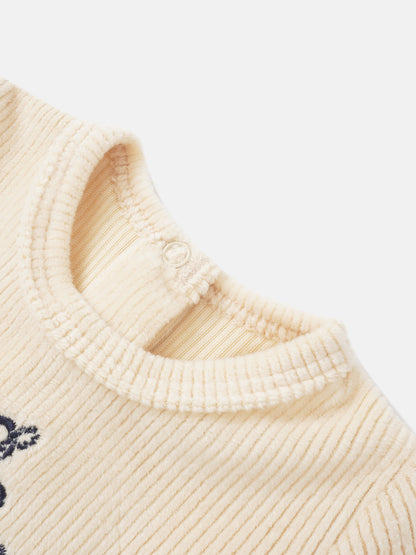 Adee Embroidered Anchor Stretchy for boys; cream fleece-knit with navy anchor embroidery.