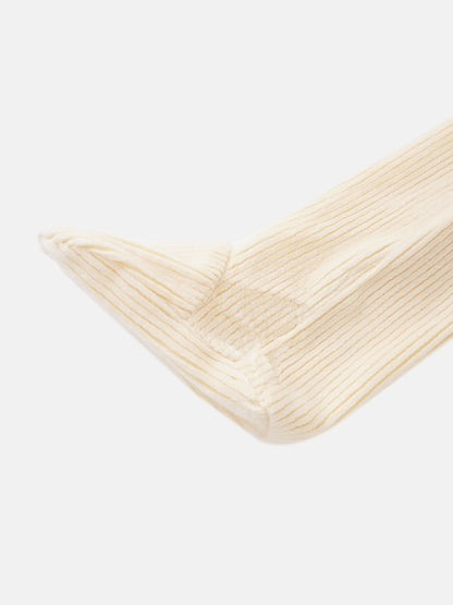 Boys Stretchies in cream ribbed knit fabric, close-up cuff view