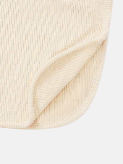 Embroidered Anchor Blanket swaddle in cream ribbed fabric; close-up texture