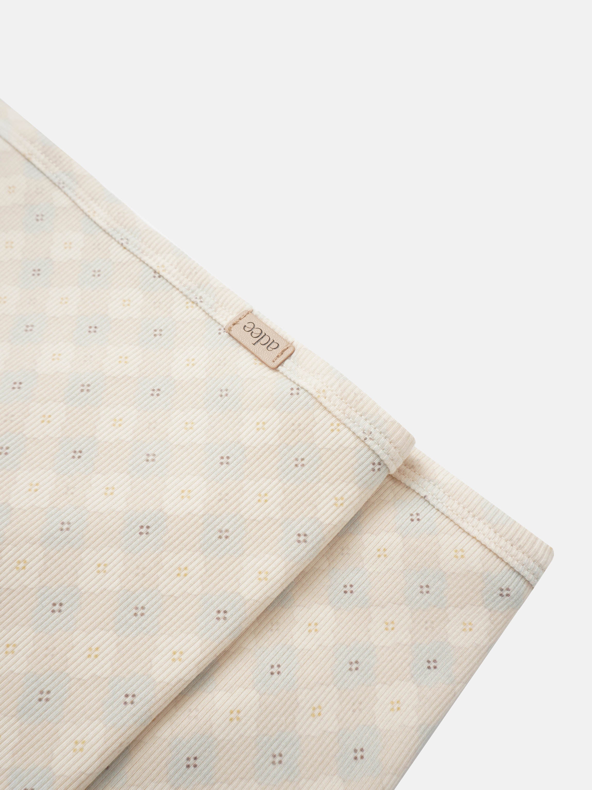 Little Button Blanket - Blue swaddle blanket for boys by Adee with a subtle dotted pattern