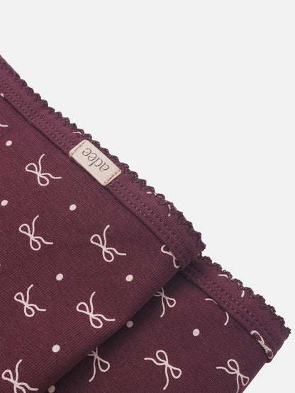 Burgundy bow blanket for girls swaddle with white bows and polka dots, Adee brand, scalloped edge