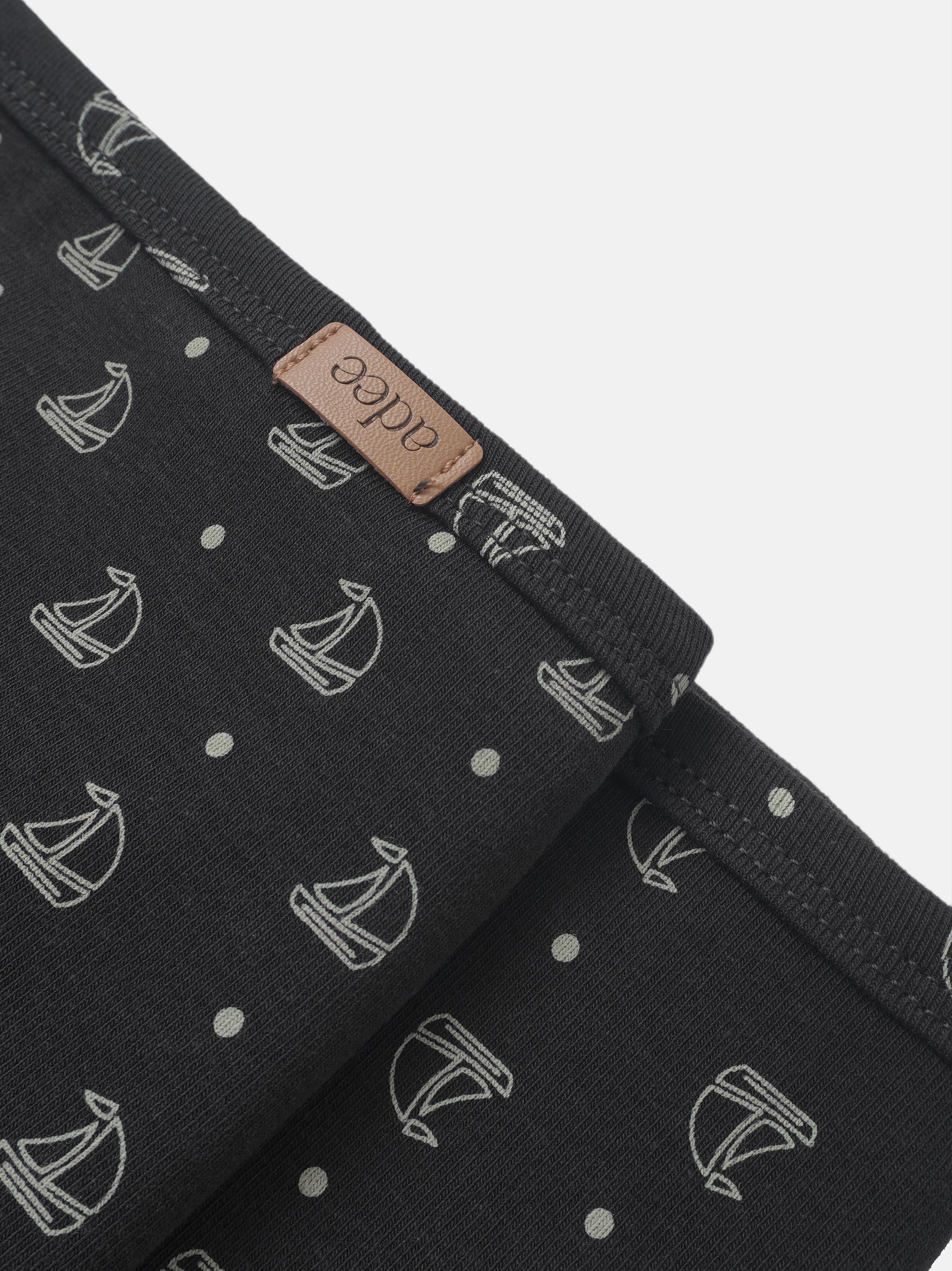 Harbor Dot Blanket by Adee, boys swaddle blanket in navy with light gray sailboats pattern and leather tag.