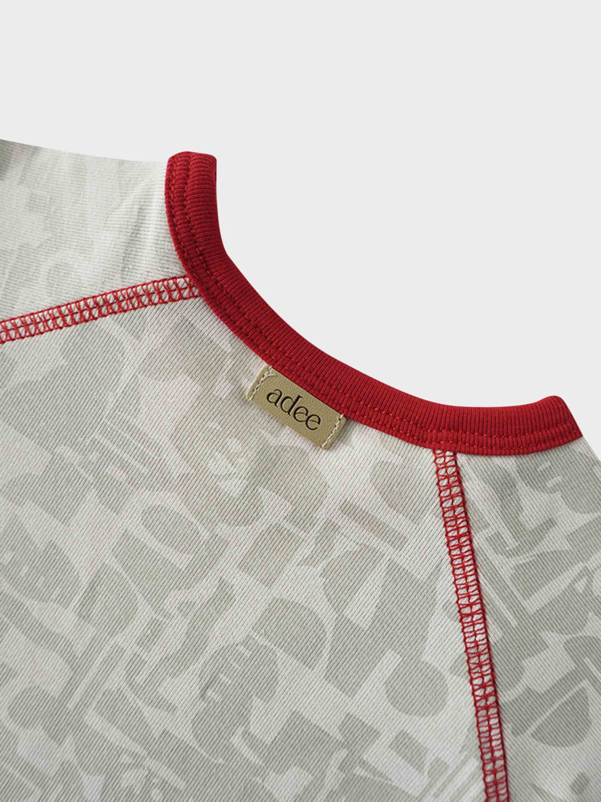 Close-up of neutral abstract-patterned toddler girls&