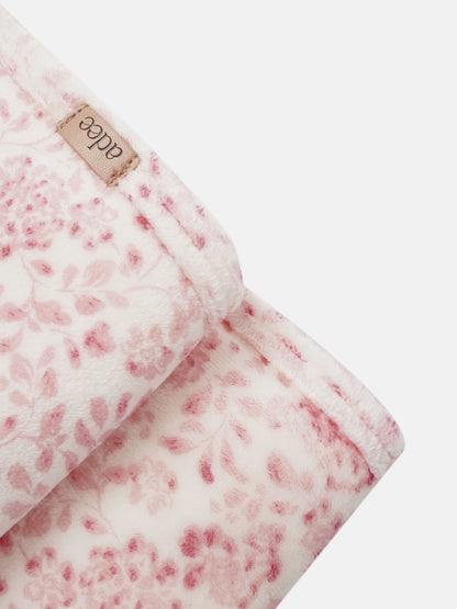 Two Tone Floral Blanket for girls by Adee; pink plush swaddle blanket with tan brand tag.