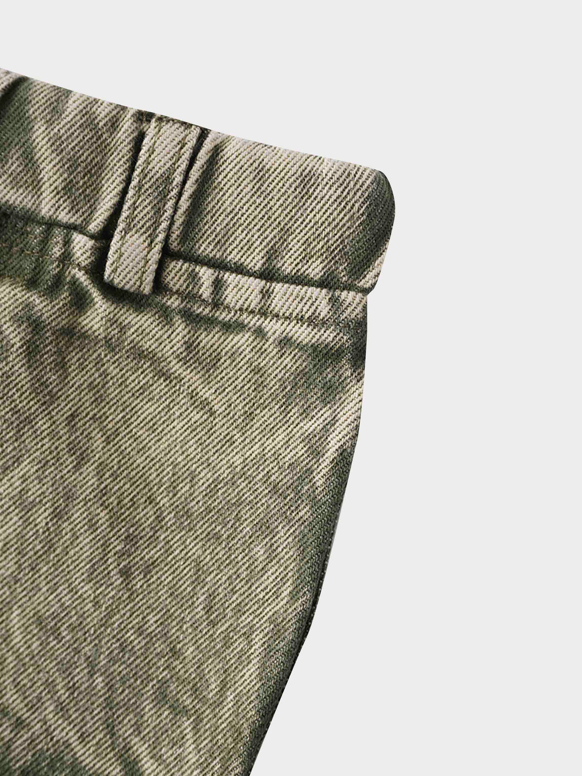 Washed green denim shorts detail
