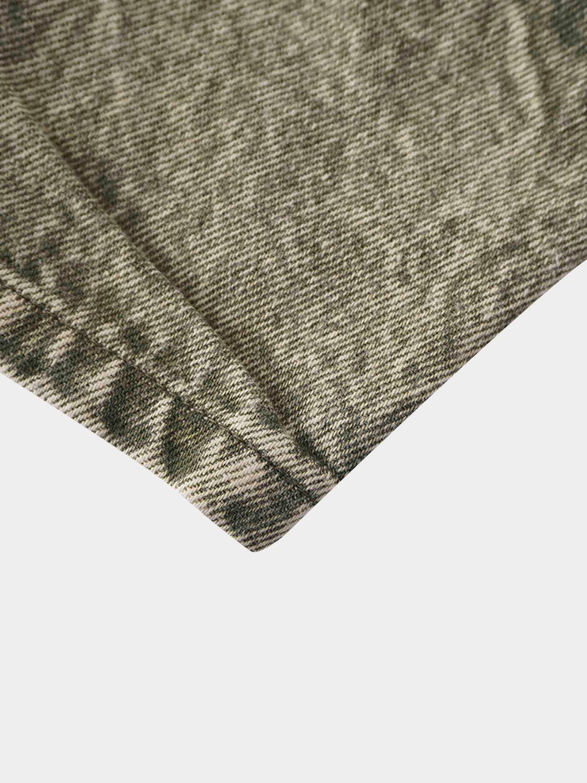 Washed green denim shorts fabric