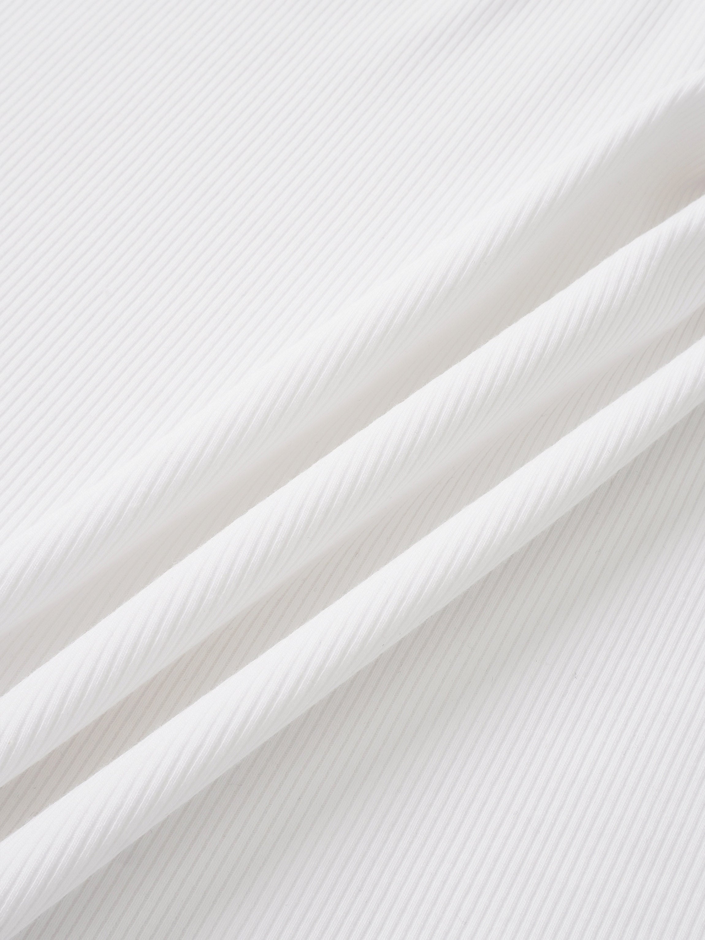 Legacy Stitch Blanket by Adee, white unisex swaddle blanket with diagonal stitch texture.