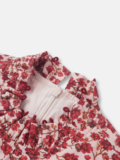 Red Flower Dress for girls with pink fabric, red floral print, ruffled edges and zipper.