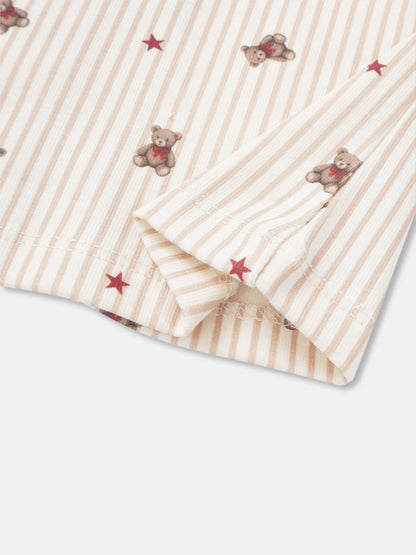 Girls striped pajama set with teddy bear prints and red stars on beige and pale pink fabric.