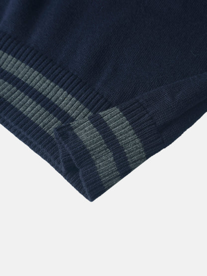 Knit navy sweater for boys with grey striped ribbed cuffs, dressy top.