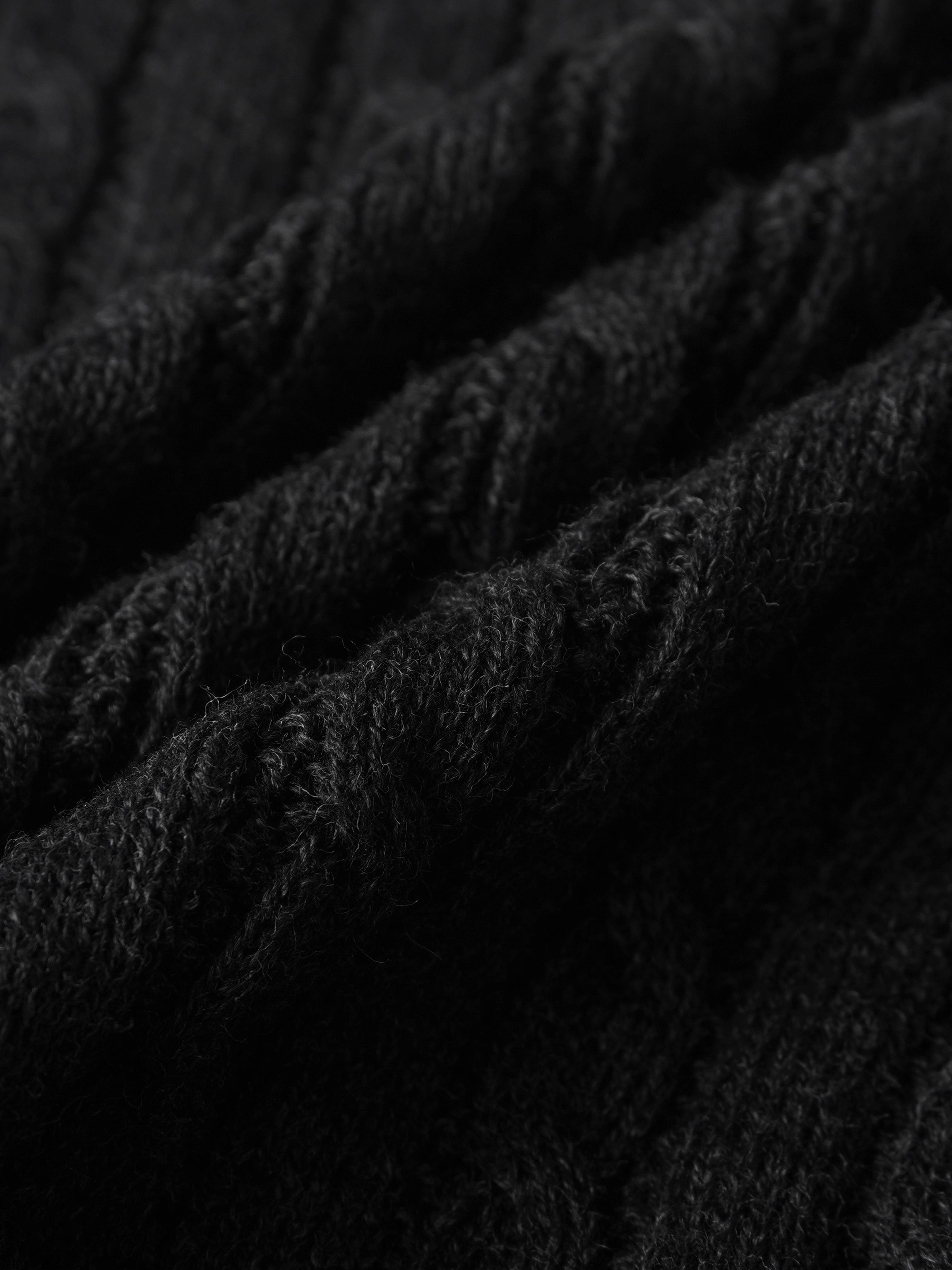 Knit sweater close-up in grey, textured knit fabric for boys dressy tops