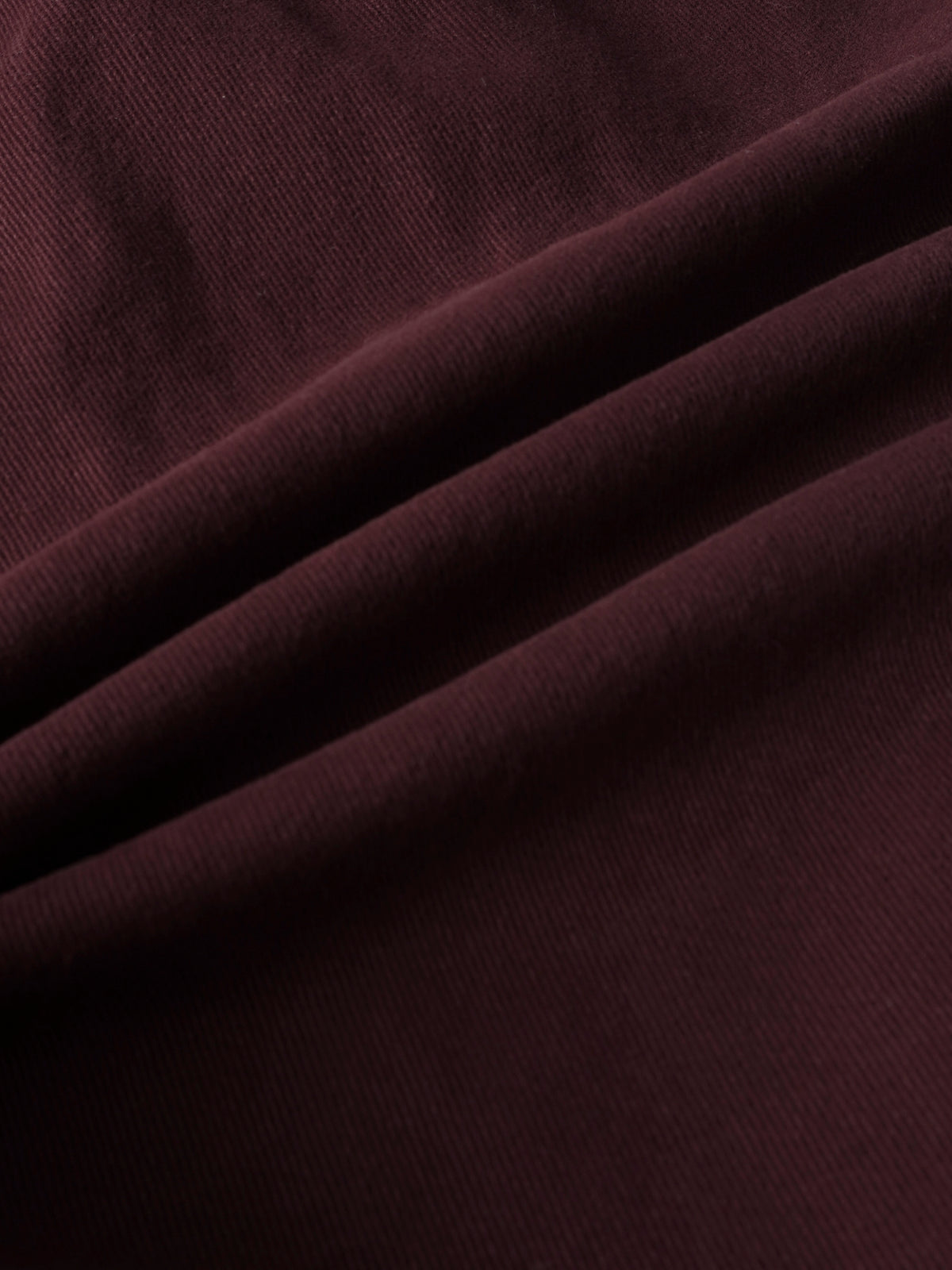 Denim jumper burgundy fabric close-up for girls&