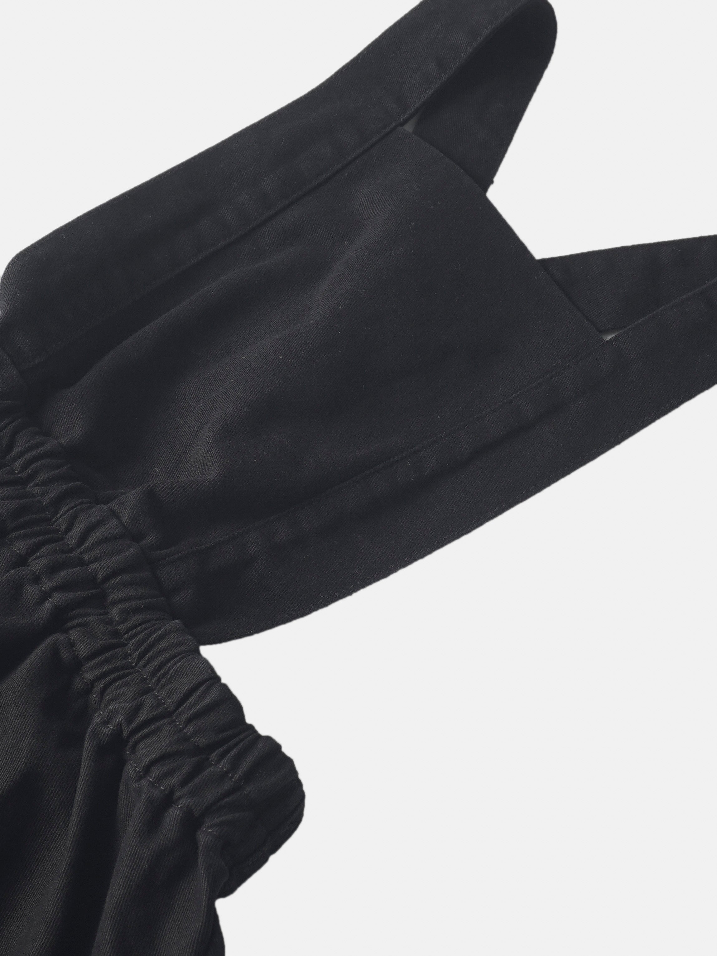 Denim jumper dress with elasticized waist in black for girls