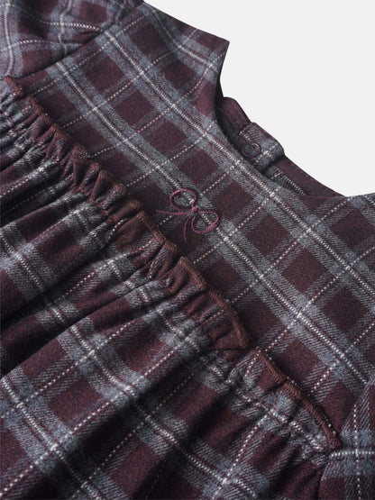 Plaid burgundy girls romper dressy by Adee; close-up shows plaid fabric with elastic waist.