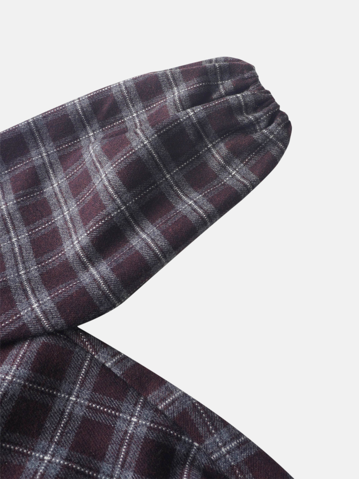 Plaid burgundy fabric close-up for girls&