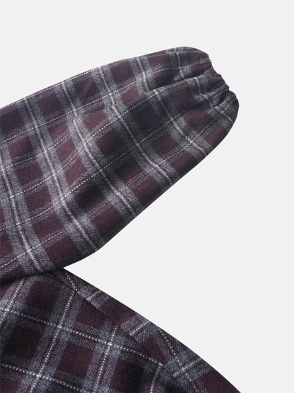 Plaid burgundy fabric close-up for girls&