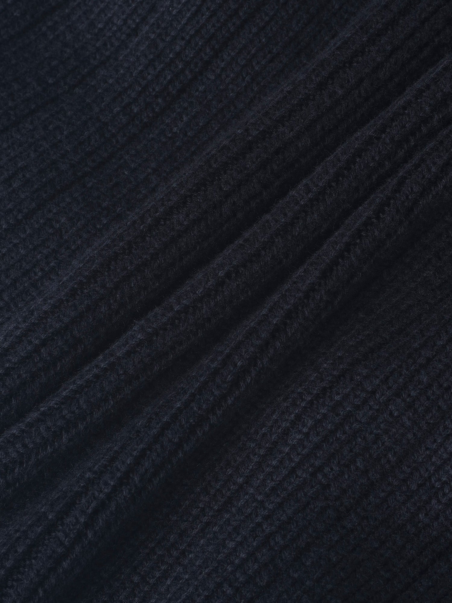Knit blazer in navy knit fabric; close-up texture for boys dressy tops