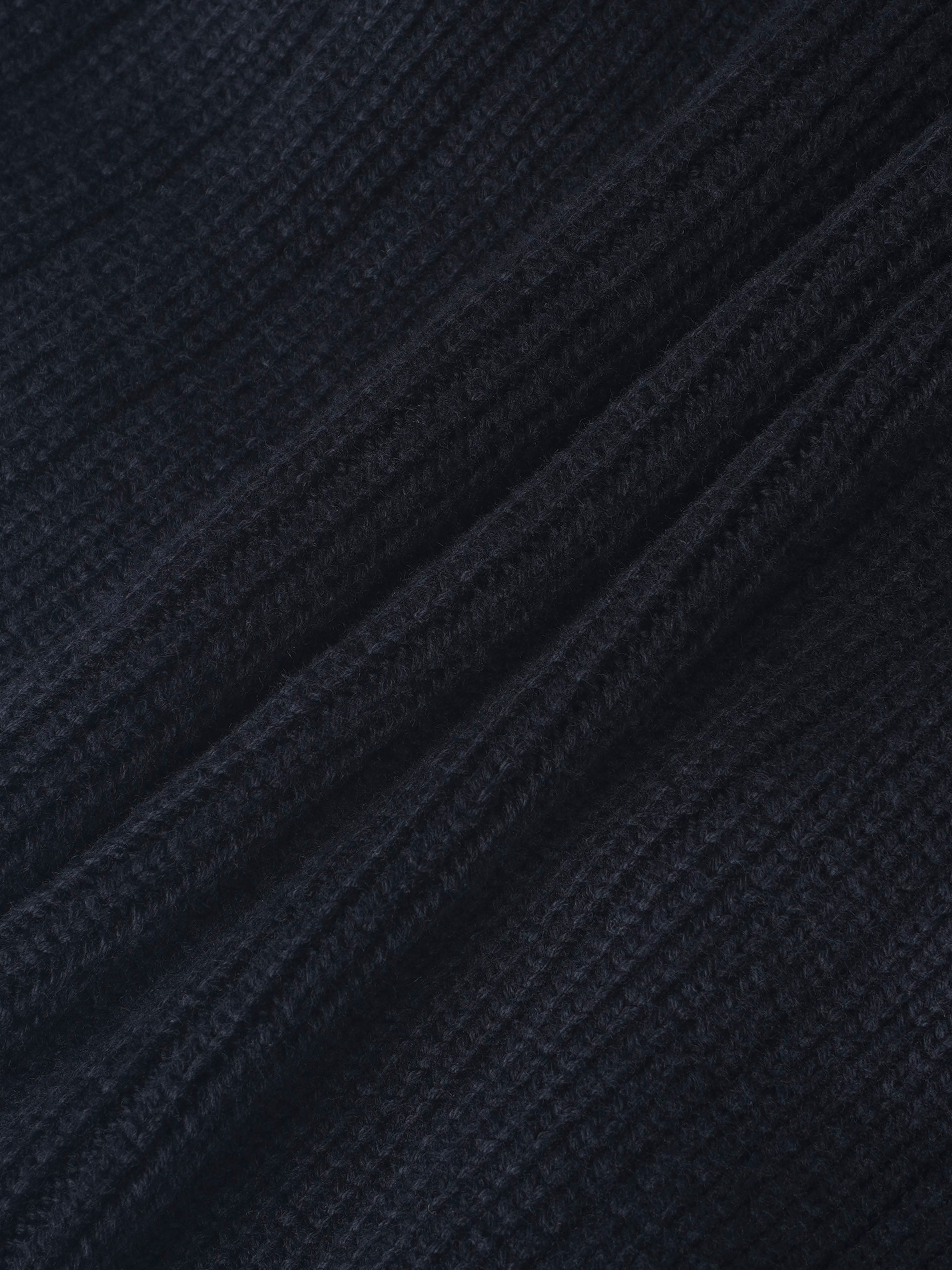 Knit blazer in navy knit fabric; close-up texture for boys dressy tops