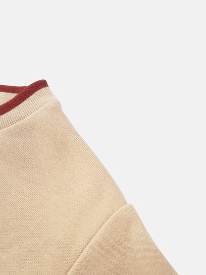 Embroidered Tulip Sweatshirt, beige knit girls top with red ribbed collar trim.